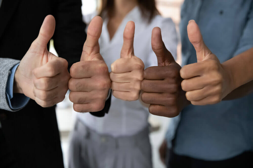 diverse business team people hands showing thumbs up.